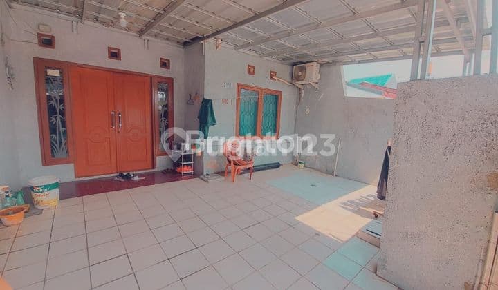 RUMAH SATU SETENGAH LANTAI PERUMAHAN HARAPAN INDAH BEKASI