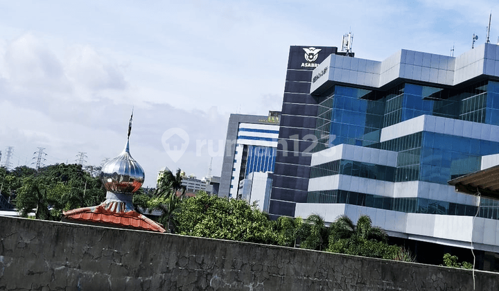 Tanah Cawang Dijual Berikut Bangunan 2 Lantai Strategis Depan Jalan Raya SHM On Hand Hadap Timur