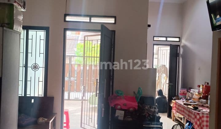 Rumah 2 lantai Poris Indah, bangunan terawar, lingkungan nyaman, bebas banjir