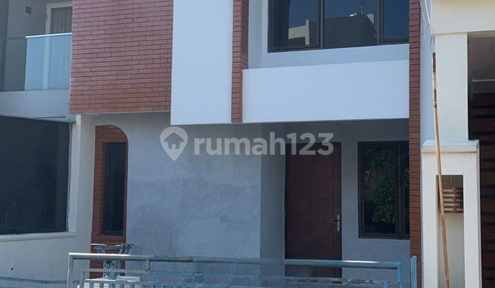 Two-story Citraland house fully renovated with marble for sale.