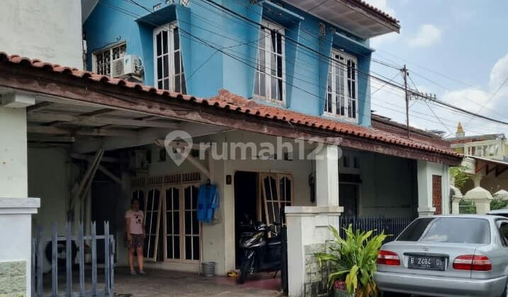 Rumah Hook Pinggir Jalan