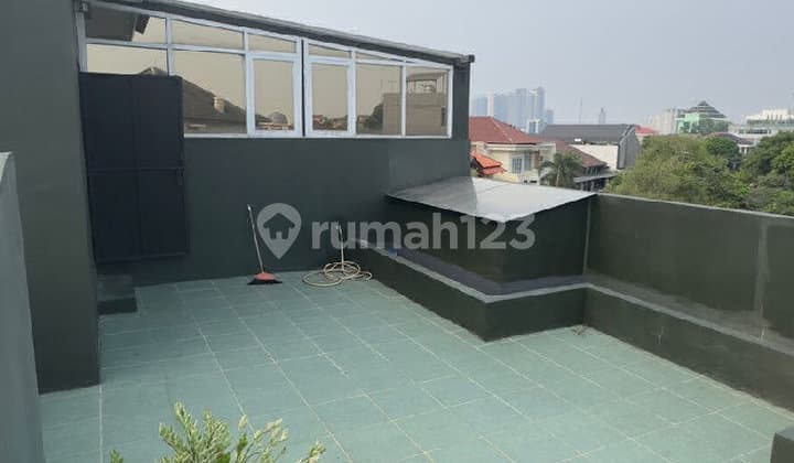 Rumah Induk dan 6 Kamar Kost di Tosiga Kebun Jeruk Bgs Investasi