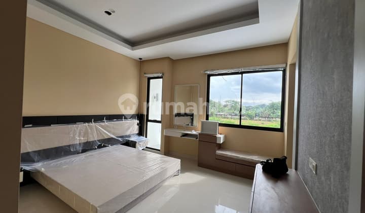 (Aby) The house in Gading Serpong is very cheap.