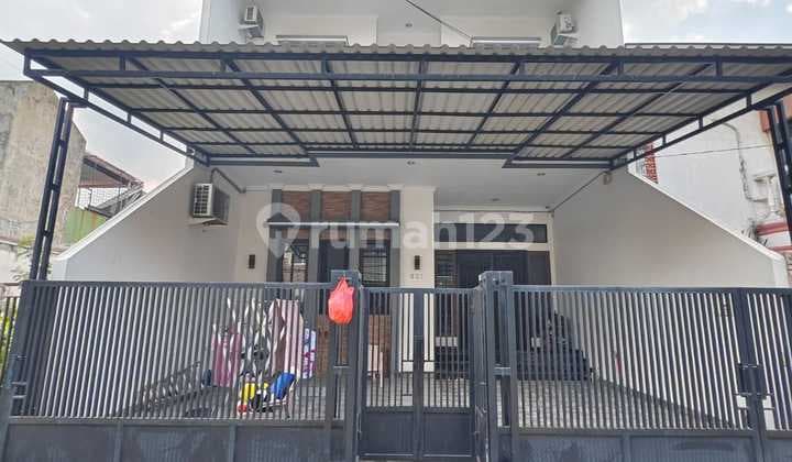 Two-story house in Kelapa Puyuh, flood-free area, Kelapa Gading, North Jakarta.