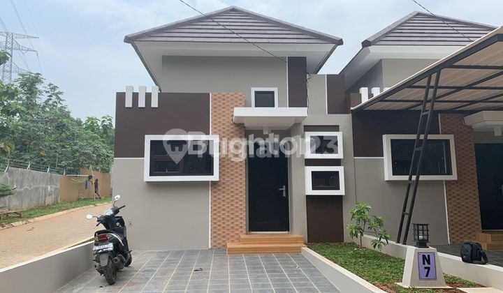 HUNIAN MUNGIL DENGAN ROW JALAN LUAS DI PERUMAHAN DEPOK