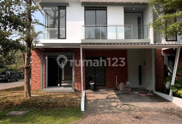 Rumah Hook Gaya Minimalis Modern 2 Lantai Dengan Taman Samping Dan Taman Belakang