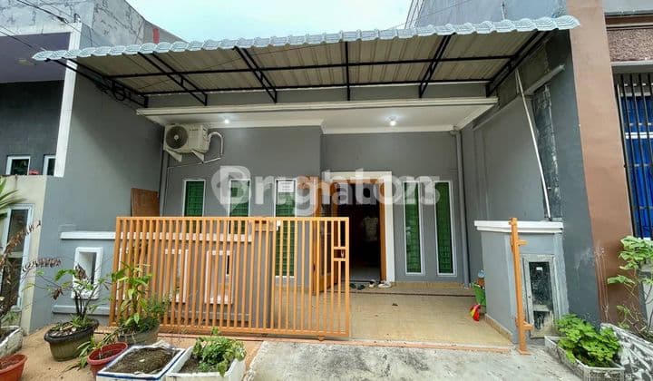 Rumah 1 ¹/² Lantai