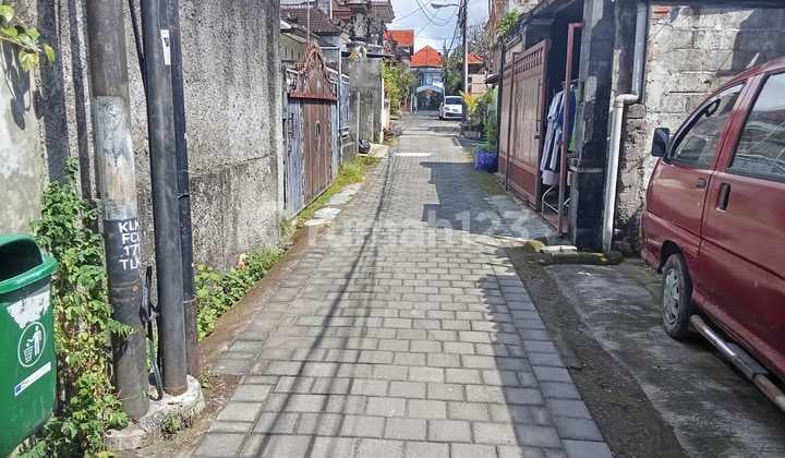 Sebidang Tanah Kavling Berisi Bangunan Rumah