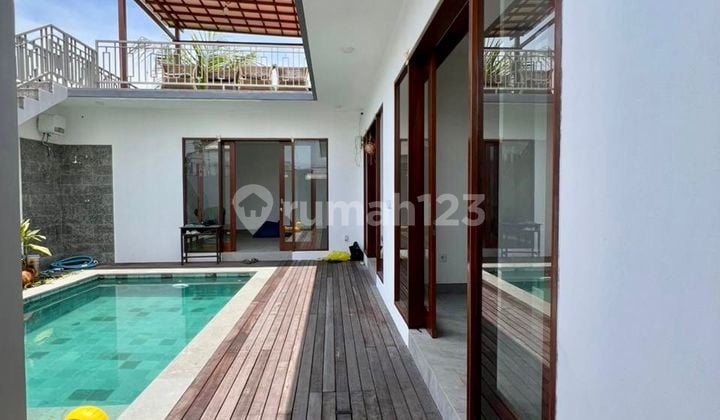 Brand new semi-furnished 2 bedroom villa with enclosed living room in Tumbak Bayuh, Pererenan with rooftop terrace