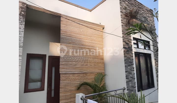 Rumah Cluster Andara Cinere Bagus dengan Void, Fish Pool, Rooftop