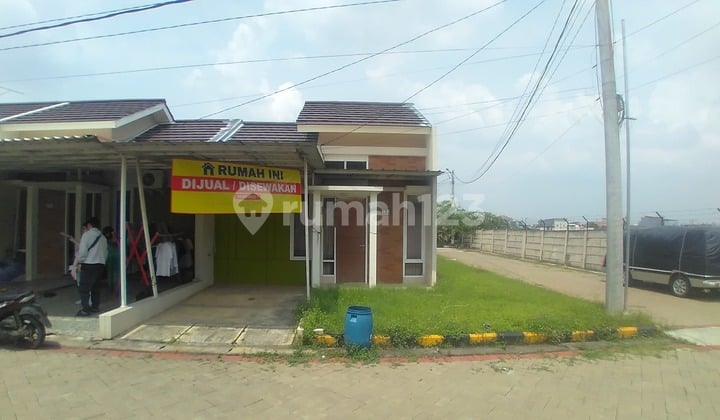 Jual Cepat Rumah Posisi Hook Kondisi Bagus, Nyaman, dan Asri di Perumahan Orchard Village, Babelan, Bekasi.