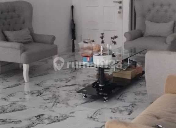 Translated to English: Fast Sale, Ready-to-Occupy House in Legenda Wisata Cibubur, Near Nagrak Toll Access, Near Living World Mall, School, Hospital.