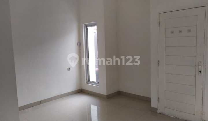 Rumah Komplek Puri Garuda Semi Furnished