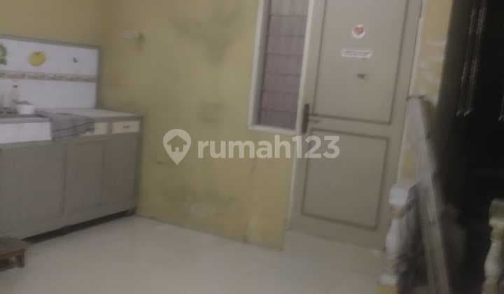 For Sale House in Permata Regensi Housing Complex Tangerang Kotabumi Tangerang, SHM, On Wide Street Row