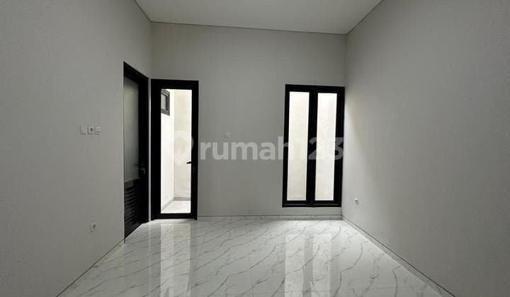 For Sale: 2-Story Minimalist House. Main Road Location, Kutisari, Surabaya, with Certificate of Ownership.