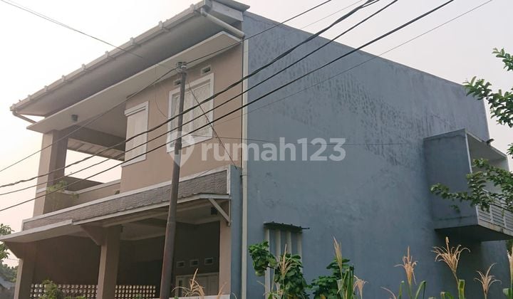 DI JUAL Rumah siap Huni di KIWI Residence Graha Raya Bintaro
