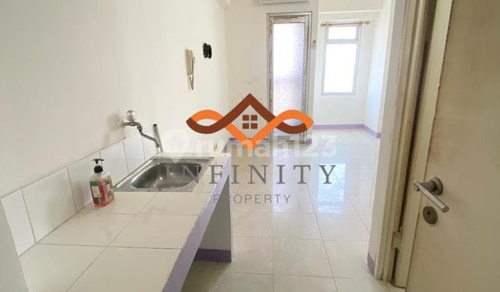 Sewa Apartemen Greenbay Pluit Tipe Studio Unfurnished View ke Kolam