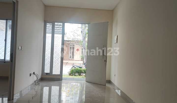 Rumah Greenlake City Cluster Amerika Latin