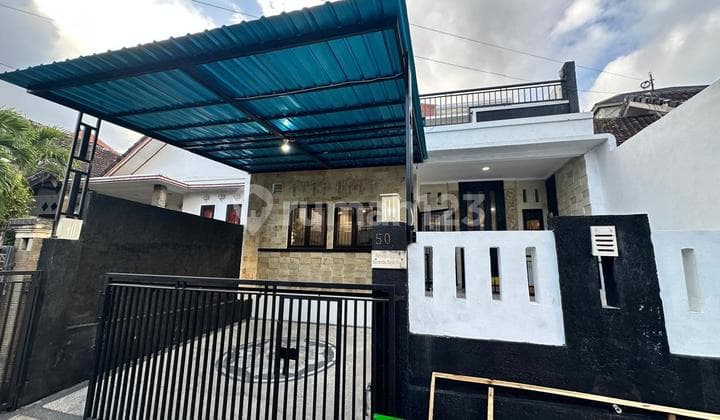 Rumah Minimalis Elegant dengan View Gwk & Sunset Mumbul Bali.