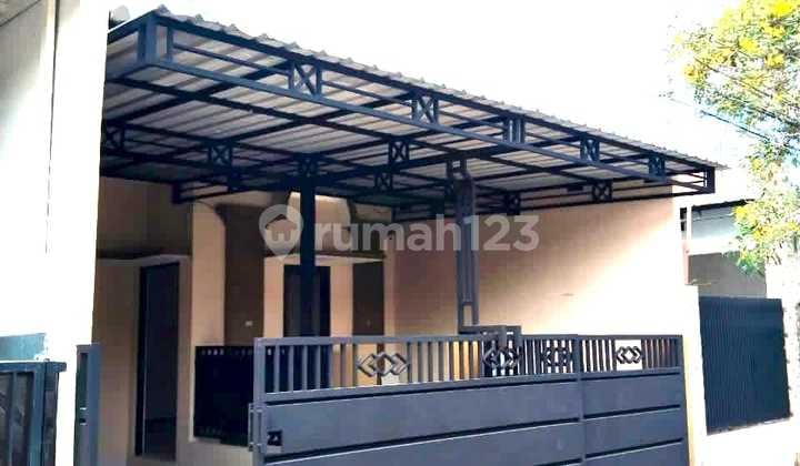 Rumah Siap Huni Taman Wiguna Selatan Free Pantri, Pagar besi, kanopi, Pompa air