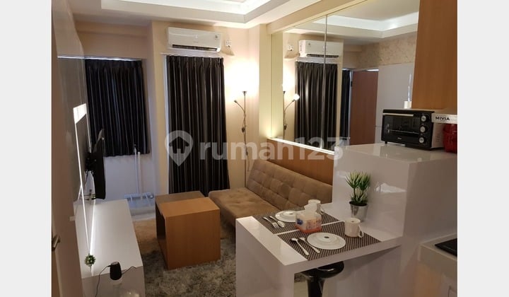 JUAL RUGI APARTEMEN 2 BR FULL FURNISH PUNCAK DHARMAHUSADA SBY