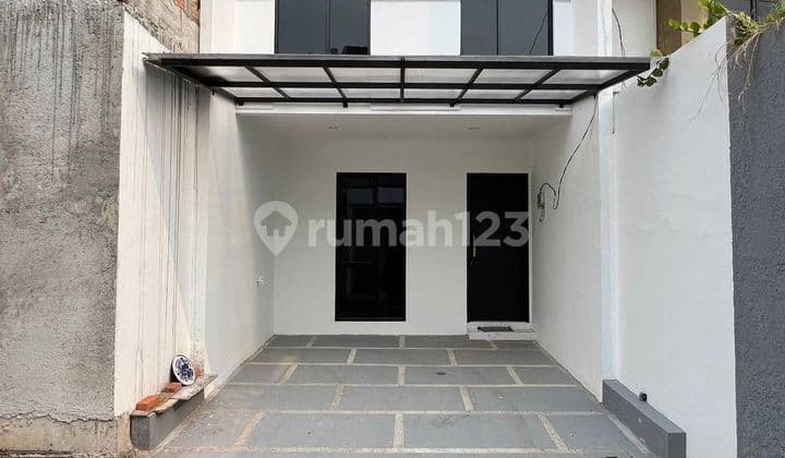 Rumah Dalam Cluster Kawan Elit Deket Pintu Tol Brigif