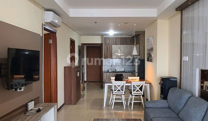 For Rent 2-Bedroom Condominium, Well-Furnished and Cool.