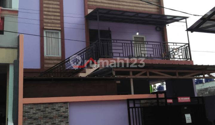 9-Door Boarding House and 4-Door Rental Unit Near UMJ