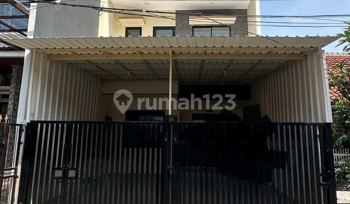 Di jual Rumah baru 2 lantai minimalis di angsoka hijau 5 cengkareng Lt 6x15 Lb 125 m2 3 kt, 2 km shm , imb , pbb lengkap pam , pln 2200 watt hadap utara bebas banjir