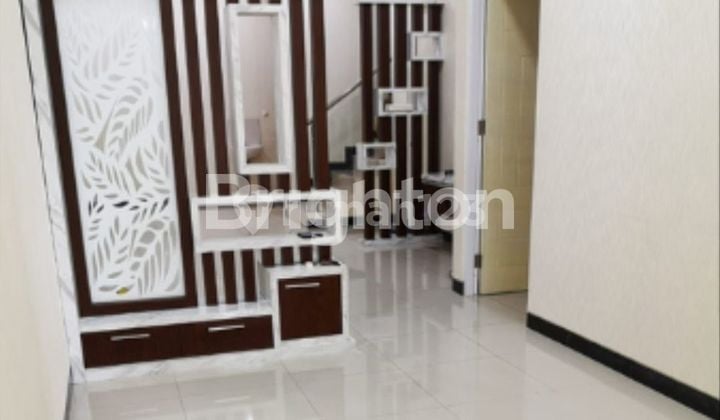 RUMAH TERAWAT SIAP HUNI DI KOMERSIAL AREA BERBAGAI UNIVERSITAS FAVORIT WARGA SURABAYA