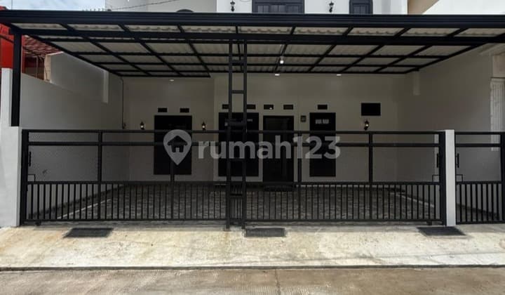 Rumah 2 LT Modern Klasik di Perumahan Pesona Anggrek Harapan Jaya