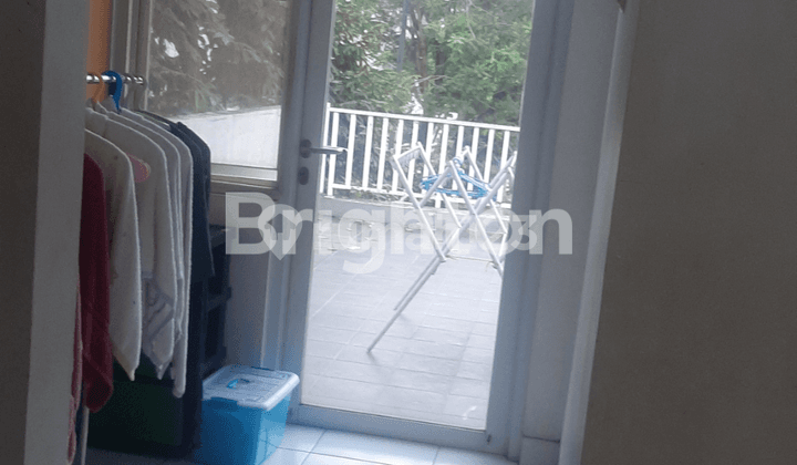 dijual rumah di kota wisata sudah baja ringan dengan desain berbeda