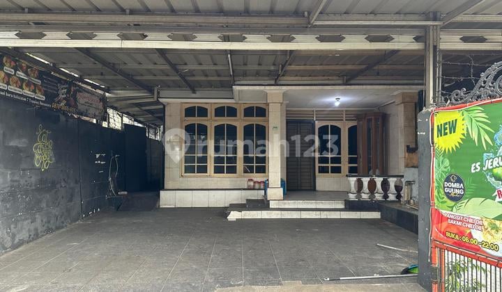 Duren Sawit. Rumah 2 Lantai. bisa untuk Usaha. Jalan Raya.