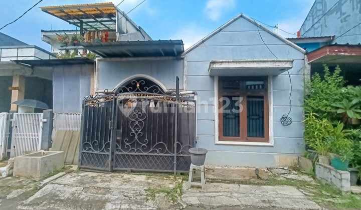 Translation: "Fast Sale House in Permata Depok Pirus Sector"