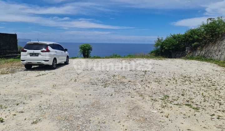 Clifftop Land White Sand Beach And Sunset View At Nusa Dua, Bali