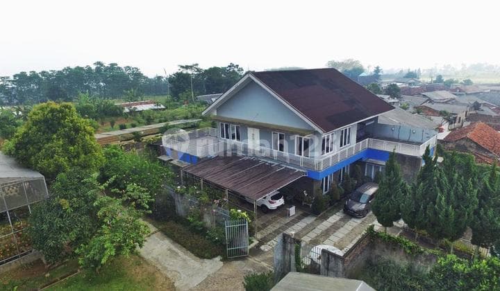 For Sale: Land with a Nice and Cozy Villa in Mega Mendung, Puncak, Bogor.