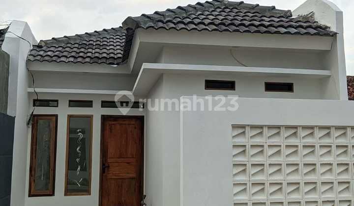 Rumah Minimalis Bebas Banjir, One Gate System, Lokasi Asri