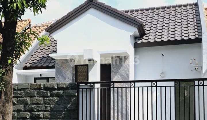 Rumah Taman Puspa Raya Citraland