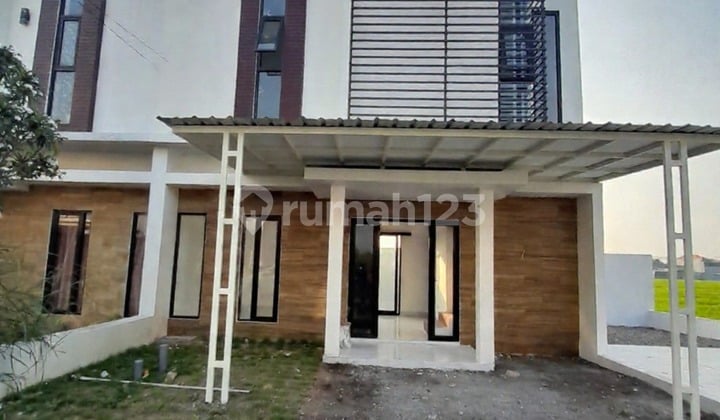 Rumah 2 Lt Lebar 12
