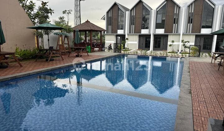 Rumah Cluster Siap Huni Fasilitas Kolam Renang