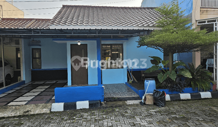 RUMAH SIAP HUNI STRATEGIS LENGKAP DENGAN TAMAN DEPAN BELAKANG BEBAS BANJIR