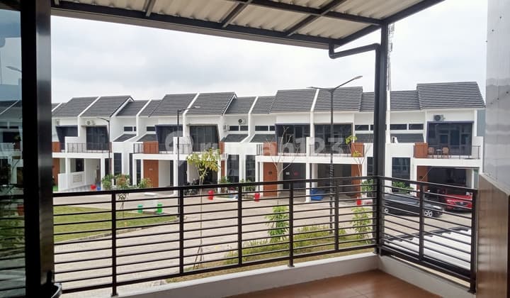 Rumah 2 Lantai , Siap Huni Dengan 4 Kamar Tidur Di Cluster Kristal Aryana Karawaci Tangerang