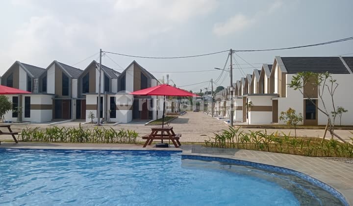 Rumah 1 Lantai Dengan Fasilitas Kolam Renang Di Cluster Safira Aryana Karawaci Tangerang
