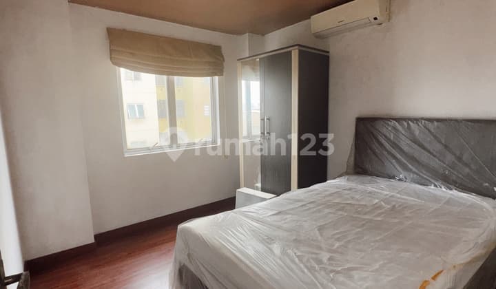 Jual Bu Apartemen, di Taman Surya 300Juta Nego Sudah Parket, TV, AC, Kulkas Dll