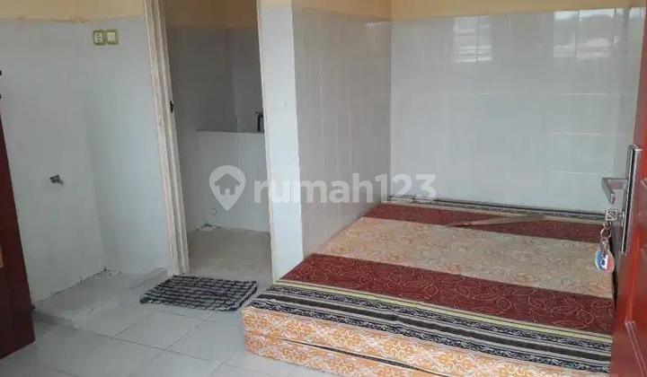 Kost Dinoyo