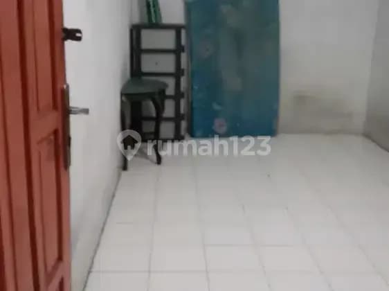 Boarding house for workers in front of Indofood or Wingsfood.