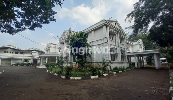 For Sale: Spacious Land with Bonus Permanent Building, Swimming Pool, and Soccer Field in the Elite Area of East Kemang, South Jakarta.