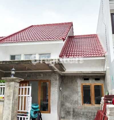 New Cheap House Ready for Finishing on the Riverbank of Malang City
