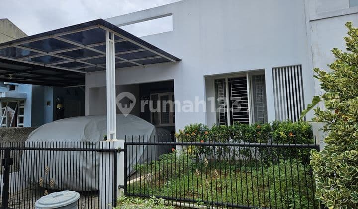 Minimalist 1.5-Story House in Graha Raya Bintaro Complex