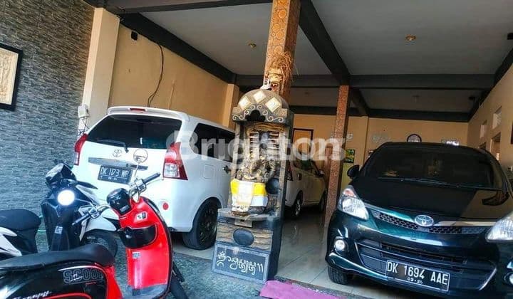 RUMAH DI PERUMAHAN MONANG MANING